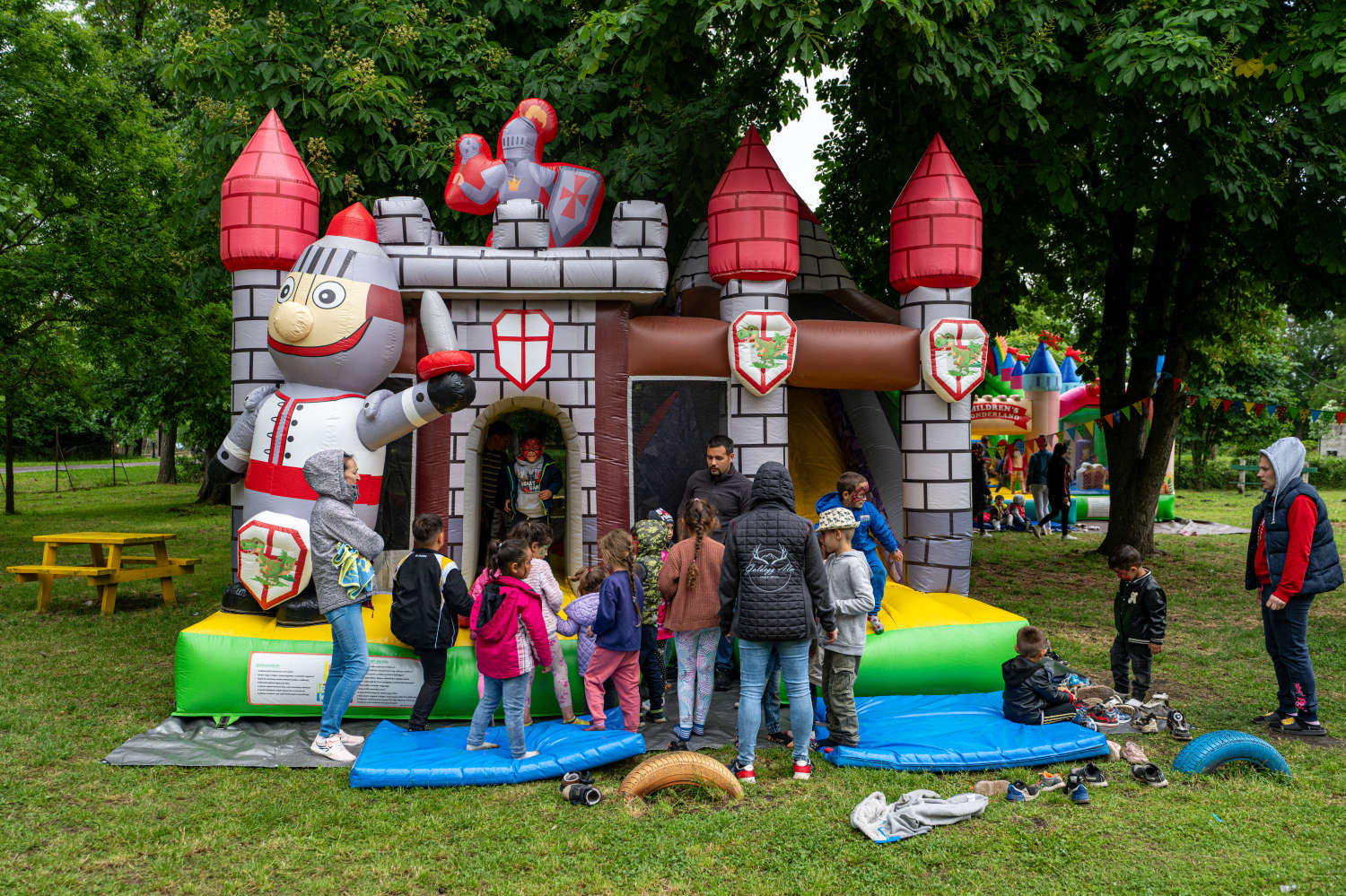 Children at the knight-themed bouncy castle